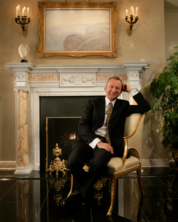 John Robert Wiltgen in Front of One of His Favorites, a 200-Year-Old Neoclassic Antique Fireplace Surround Built in Italy for an English Manor House but Now in a Chicago Loop Home Designed by His Team
