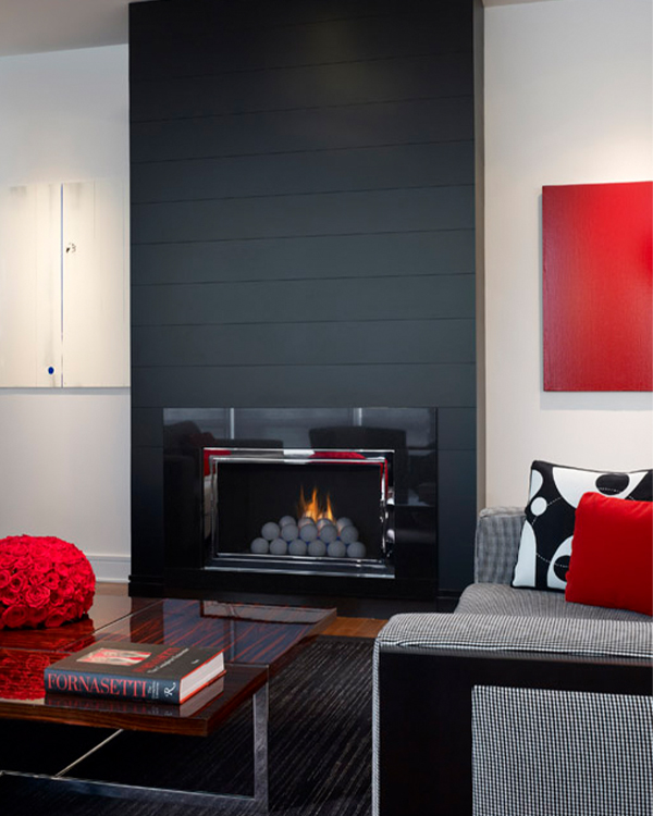 Artist Joseph Marioni’s Solid Red Canvas is a Sleek, Erudite Style Companion to the Honed Black Glass and Absolute Granite Fireplace Surround in a Chicago Trump Tower Project by John Robert Wiltgen Design